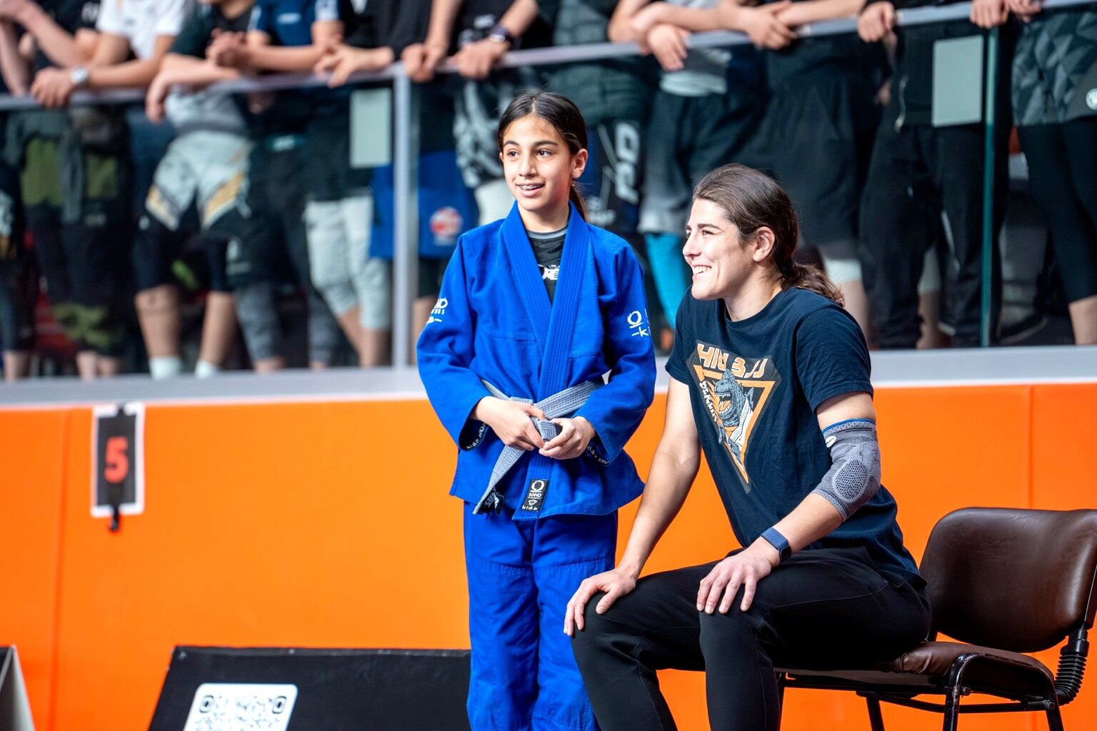 Denise Krahn coaching a young athlete
